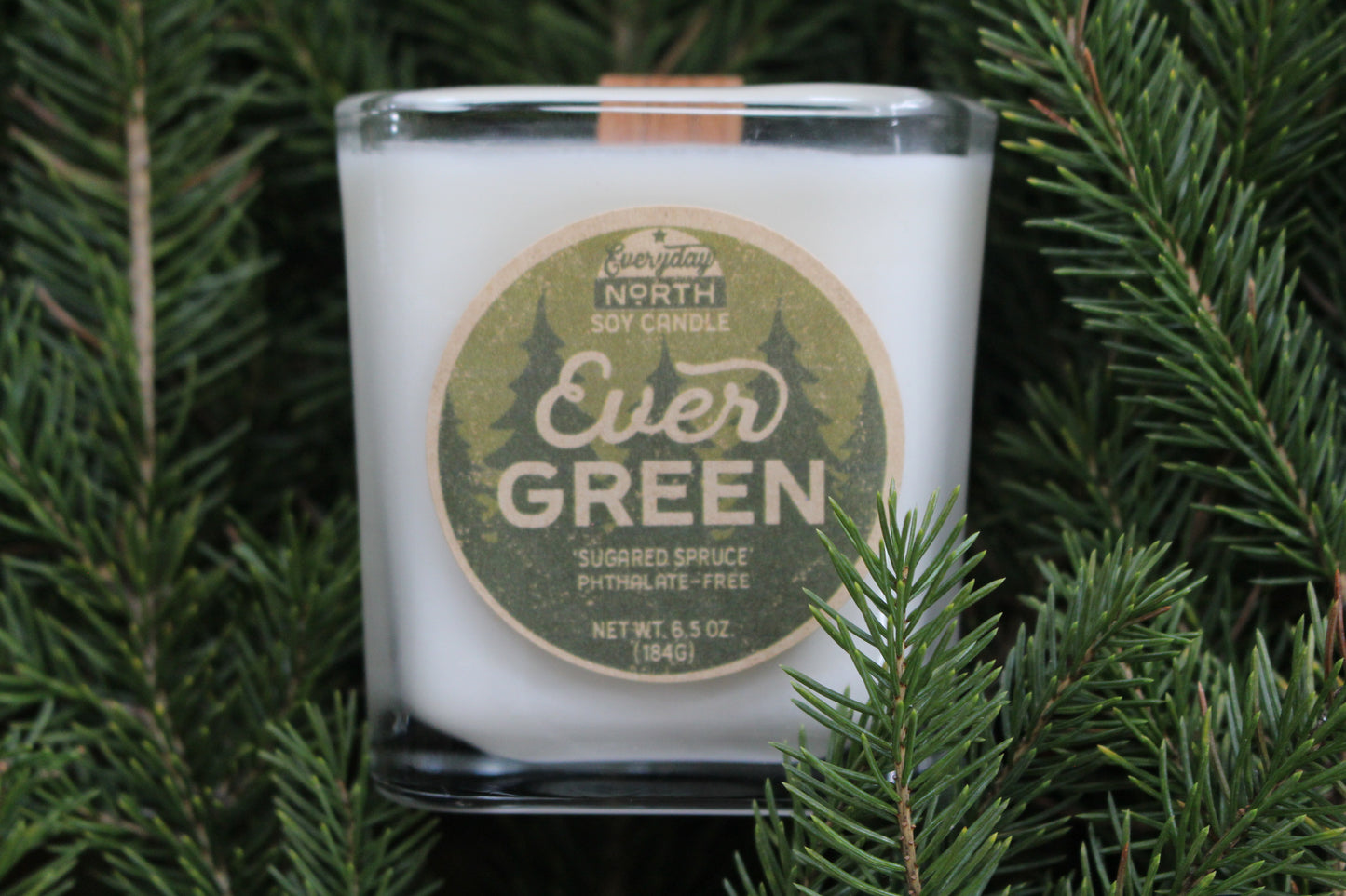 Everyday North Wood Wick Soy Candle. Evergreen. Sugared Spruce. Phthalate Free. 6.5 oz. 184 grams. Decor Surrounding Undyed Soy Wax Candle in Cube Glass Jar.
