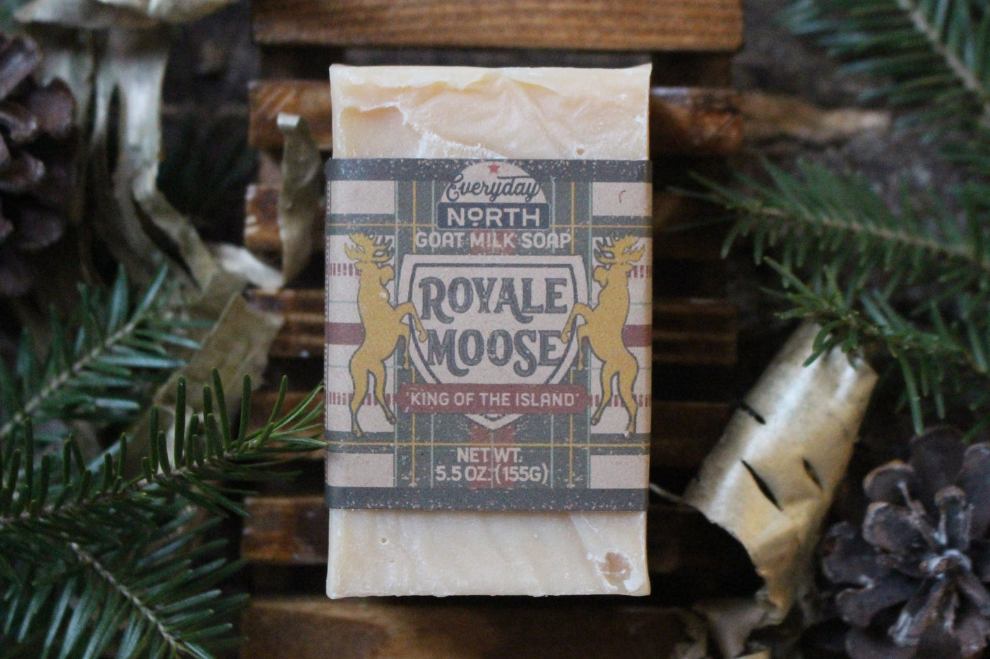 Undyed Soap Bar on Soap Dish. Wrapped in Kraft Label. Everyday North Goat Milk Soap. Royale Moose. King of the North. 5.5 oz. 155 grams. Surrounded by decor.