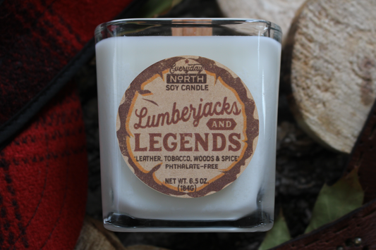 Everyday North Wood Wick Soy Candle. Lumberjacks and Legends. Leather, Tobacco, Woods and Spice. Phthalate Free. 6.5 oz. 184 grams. Decor Surrounding Undyed Soy Wax Candle in Cube Glass Jar.