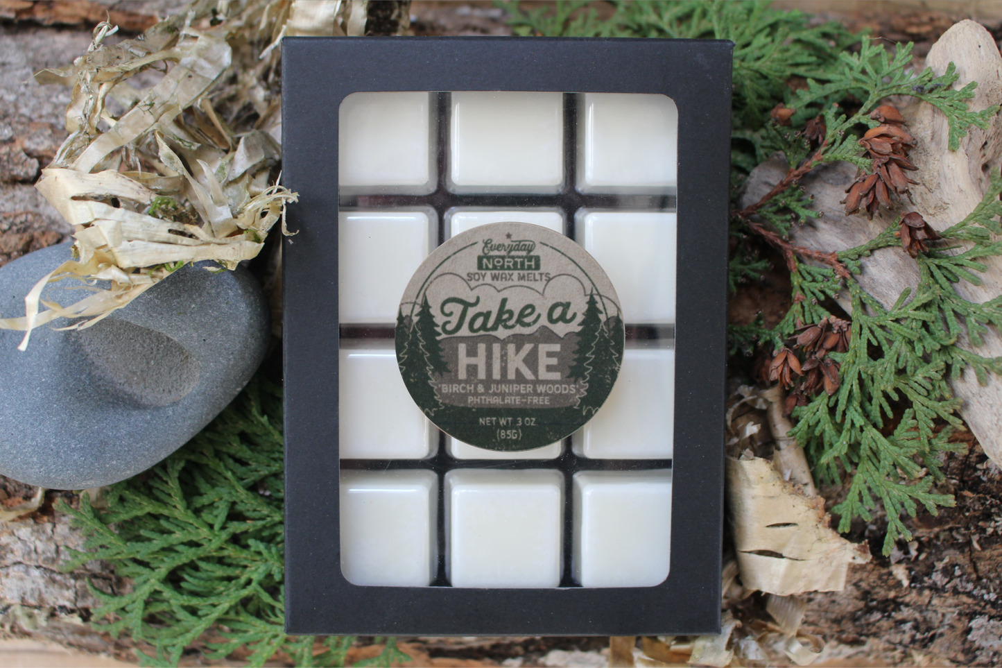 Everyday North Soy Wax Melts. Take a Hike. Birch and Juniper Woods. Phthalate Free. 3 oz. 80 grams. Decor Surrounding 12 Tray Wax Melt Undyed Black Box.