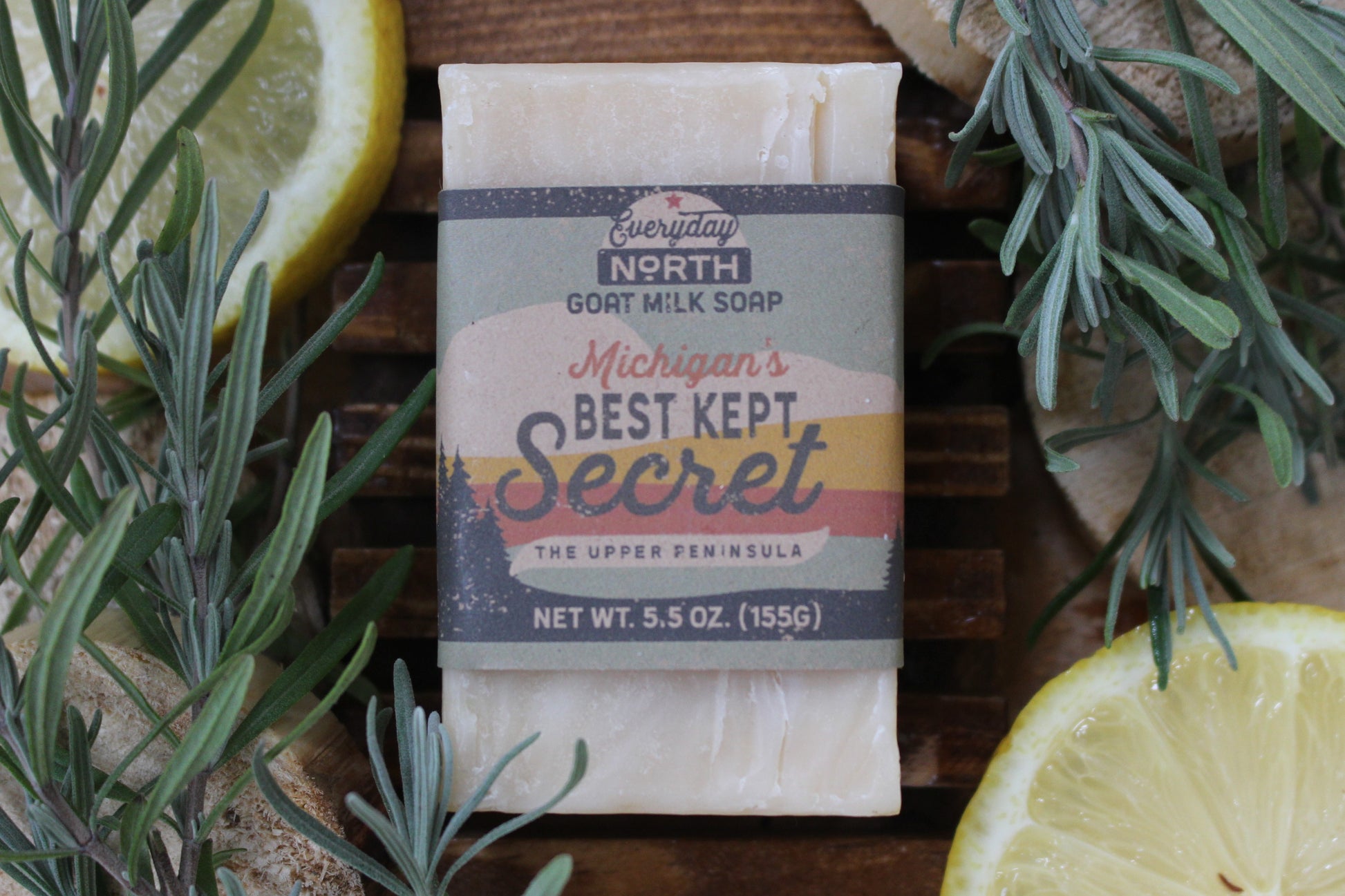 Undyed Soap Bar on Soap Dish. Wrapped in Kraft Label. Everyday North Goat Milk Soap. Michigan's Best Kept Secret. The Upper Peninsula. 5.5 oz. 155 grams. Surrounded by decor.