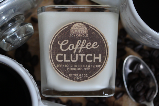 Everyday North Wood Wick Soy Candle. Coffee Clutch. Dark Roasted Coffee and Cream. Phthalate Free. 6.5 oz. 184 grams. Decor Surrounding Undyed Soy Wax Candle in Cube Glass Jar.