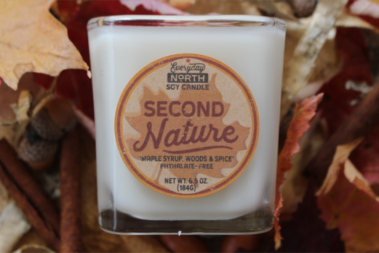 Everyday North Wood Wick Soy Candle. Second Nature. Maple Syrup, Woods and Spice. Phthalate Free. 6.5 oz. 184 grams. Decor Surrounding Undyed Soy Wax Candle in Cube Glass Jar.