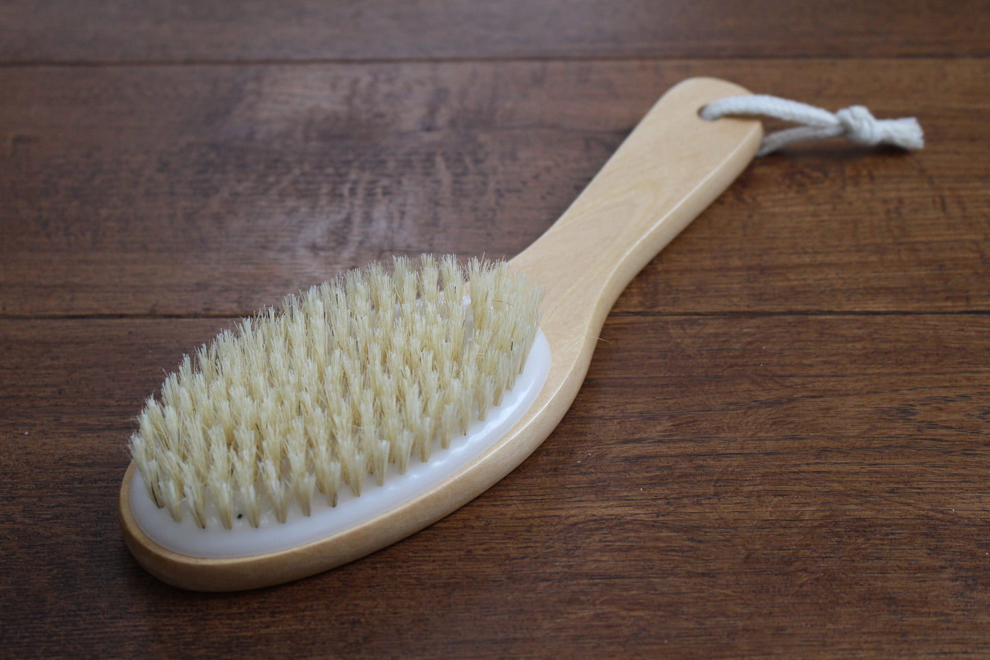 Natural Stain Natural Bristle Body Brush with Contoured Handle and Rope Tie on End of Handle